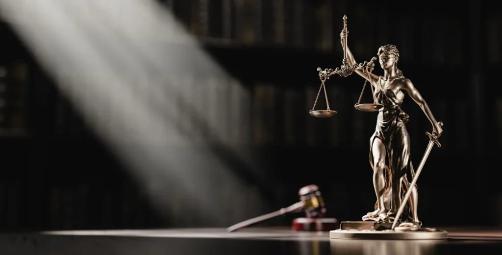 Image of Lady Justice statue, representing integrity in legal practice at R Suresh & Associates.
